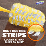Close-up of a yellow Swiffer heavy duty duster head on wood surface with text about dust-busting strips