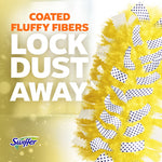 Close-up promotional image of a yellow Swiffer duster head showing coated fluffy fibers and text 'lock dust away'