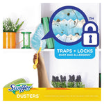 Hand reaching with a Swiffer duster toward a shelf, with Trap + Locks magnified callout and Swiffer branding