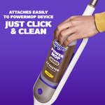 Hand inserting a Swiffer Power Mop Wood lemon refill into the mop handle on a purple background with “Just click & clean” instructional text.