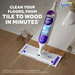Swiffer Power Mop shown cleaning a transition from tile to wood floor with visible dirt being removed and product branding on the mop body