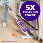 Swiffer PowerMop device being used on a hardwood floor near appliances with large purple badge reading '5X cleaning power'