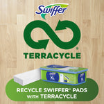 Terracycle recycling promotion with Swiffer logo, infinity recycle symbol and XL wet cloths tub on wood background