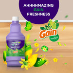 Purple Swiffer WetJet Gain refill bottle with illustrated flowers and Gain logo and freshness headline