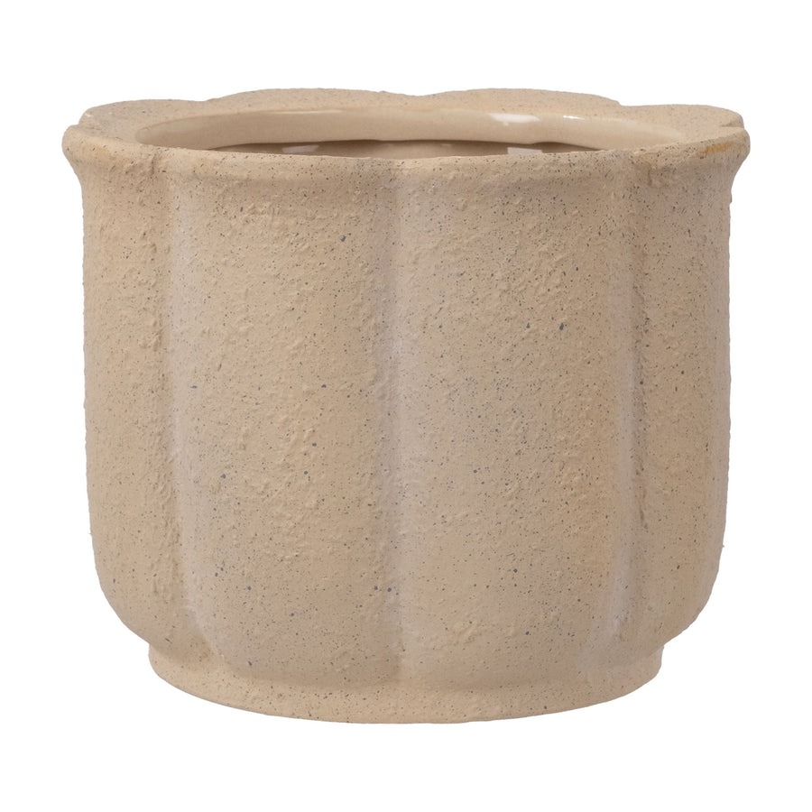 Tan textured ceramic planter with scalloped vertical ribs and a slightly flared rim, neutral speckled finish.