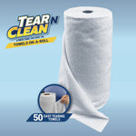 Unwrapped white Tear N Clean microfiber roll standing upright with a sheet draped and brand logo on blue background