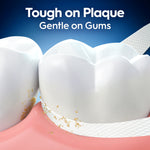 Close-up illustration of teeth and gums with textured floss at the gumline and headline about plaque and gentle gums