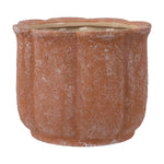 Terracotta scalloped ceramic planter with textured weathered finish, straight-on view showing interior rim.