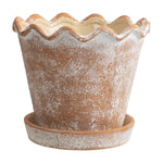 Terracotta ceramic planter with scalloped wave rim and matching saucer, whitewashed finish