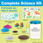 Infographic layout showing kit contents: glow-in-the-dark stickers, figurines, glowing sand, chia seeds, stones, potting mix and a plastic terrarium jar.