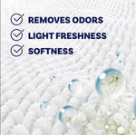 Textured fabric background with floating bubbles and checklist text: Removes Odors, Light Freshness, Softness.