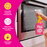 Lifestyle image of a hand spraying The Pink Stuff cleaner on an oven door with icons highlighting versatile cleaning and sparkling results