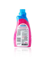 Rear label and safety information of The Pink Stuff Miracle Laundry Sensitive detergent bottle with blue cap.