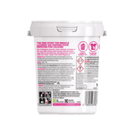 Rear view of The Pink Stuff Oxi Powder tub showing directions, warnings and barcode on white background