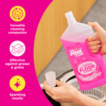 Hands pouring The Pink Stuff floor cleaner into a measuring cap with icons and benefit text at left
