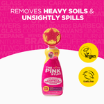 Product shot of The Pink Stuff carpet and upholstery cleaner with star brush and vegan and cruelty-free badges on pink background