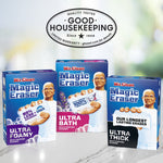 Three Mr. Clean Magic Eraser product boxes arranged under a Good Housekeeping seal on a countertop