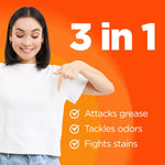Smiling woman pointing at her white T-shirt beside text '3 in 1' and checklist of attacks grease, tackles odors, fights stains.