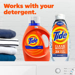 Promotional image showing a Tide detergent jug next to a Tide Clean Boost clear rinse bottle on a laundry surface with headline ‘Works with your detergent.’