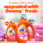 Two orange Tide + Downy detergent bottles with towels and text highlighting the product upgrade to Downy fresh