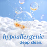 Artistic close-up of bubbles and foam with suspended clear spheres above foam and text 'hypoallergenic deep clean.'
