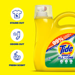 Close-up of the left side of a yellow Tide Simply jug with three circular icons and text reading stains out, odors out, fresh scent