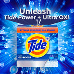 Tide Ultra Oxi Boost powder box centered on a blue bubbly background with 'Unleash Tide Power + Ultra OXI' headline