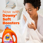 Person smelling a white sheet with a Tide Plus Downy April Fresh bottle and headline about Downy Soft Boosters