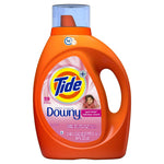 Clean product shot of Tide Plus Downy April Fresh orange detergent bottle on white background showing label details