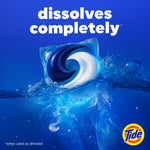 Single Tide POD partially submerged in water with large text 'dissolves completely' on a blue background and the Tide logo