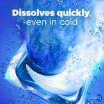 Artistic rendering of a Tide POD dissolving in water with splashes and text stating it dissolves quickly even in cold