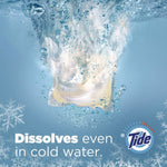 Laundry pod dissolving underwater with text that reads dissolves even in cold water and small Tide logo