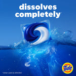 Tide PODS pod dissolving in vivid blue water with headline ‘dissolves completely’ and Tide logo at corner