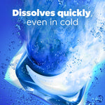 Artistic underwater-style image of a Tide PODS detergent pod dissolving with bubbles and motion effects