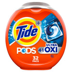 Orange Tide PODS plastic tub showing Tide logo, Ultra OXI branding and a blue-white detergent pac illustration.