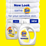 Promotional graphic showing old and new Tide Simply bottles in front of stacked white towels reading 'New Look, same Tide Simply for your sensitive skin'