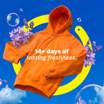 Orange hoodie floating against blue background with text '14+ days of lasting freshness' and floral accents