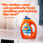 Tide Ultra Odor+Oxi bottle on a washer with quoted shopper testimonial text in large orange font