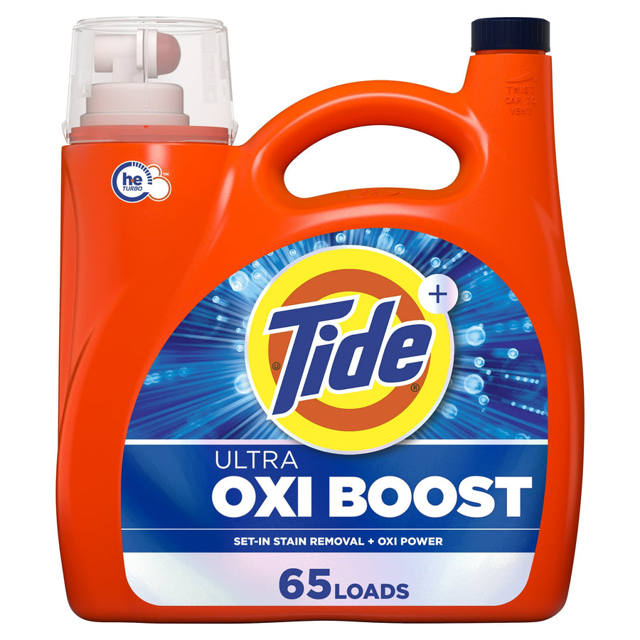Orange Tide Ultra Oxi Boost liquid detergent bottle with handle and blue label showing 'OXI BOOST' and '65 loads'