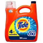 Close-up of an orange Tide Ultra OXI detergent jug showing the Tide logo and 94 loads label