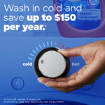 Hand adjusting a washer temperature dial from hot toward cold with partial Tide bottle visible and text about saving up to $150 per year.