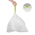 White trash bag tied by green drawstrings held by a hand with inset close-up of sealed drawstring detail