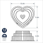 Technical line drawing of a tiered heart-shaped bundt pan with dimensions and 12-cup and cast aluminum icons