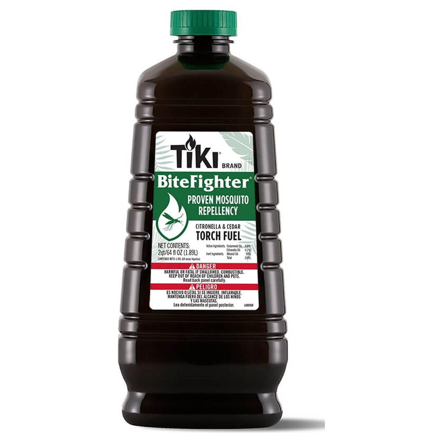 TIKI BiteFighter torch fuel bottle with green cap and front label showing citronella & cedar torch fuel branding