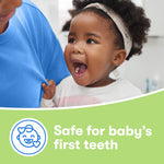 Lifestyle image of a smiling toddler looking up, paired with text panel stating product is safe for baby's first teeth