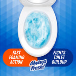 Top-down view of an open toilet bowl filled with blue foaming cleaner and graphic callouts for fast foaming and buildup fight