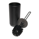 Toilet brush removed from its matte black cylindrical holder showing round black bristles and handle