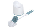 Detachable toilet brush with teal and white bristles shown alongside a white plastic caddy