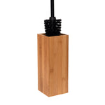 Black-bristled toilet brush head inside a tall square bamboo holder shown on white background