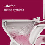 Cutaway illustration of a toilet showing pink liquid flushing through the trap with text stating it’s safe for septic systems